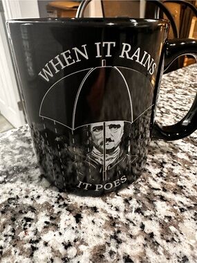 Black 'When It Rains It Poes' Ceramic Mug